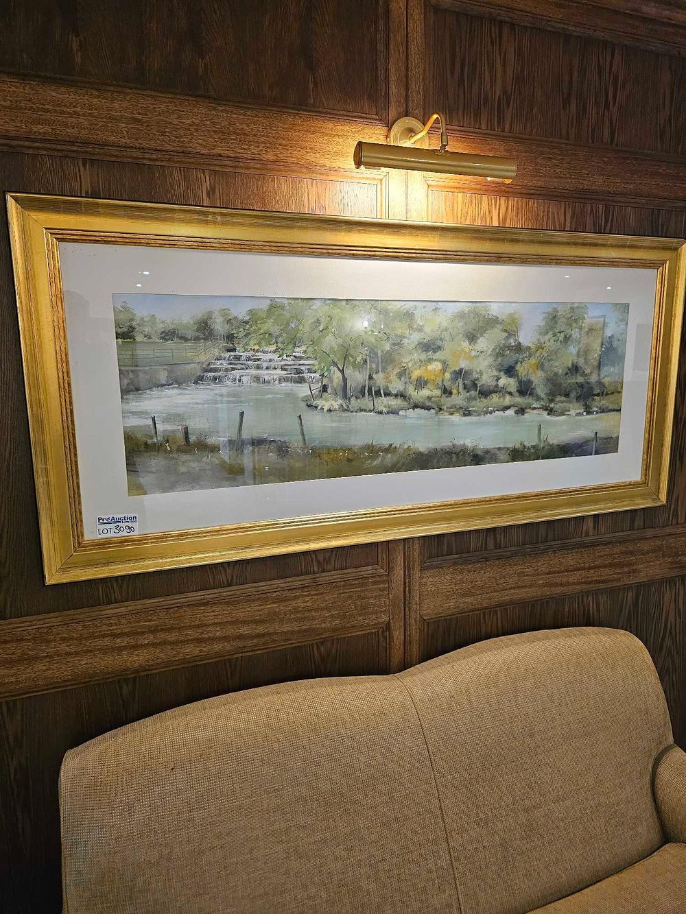 Lot 3090: * A large landscape-oriented print depicting a tranquil rierside scene with trees