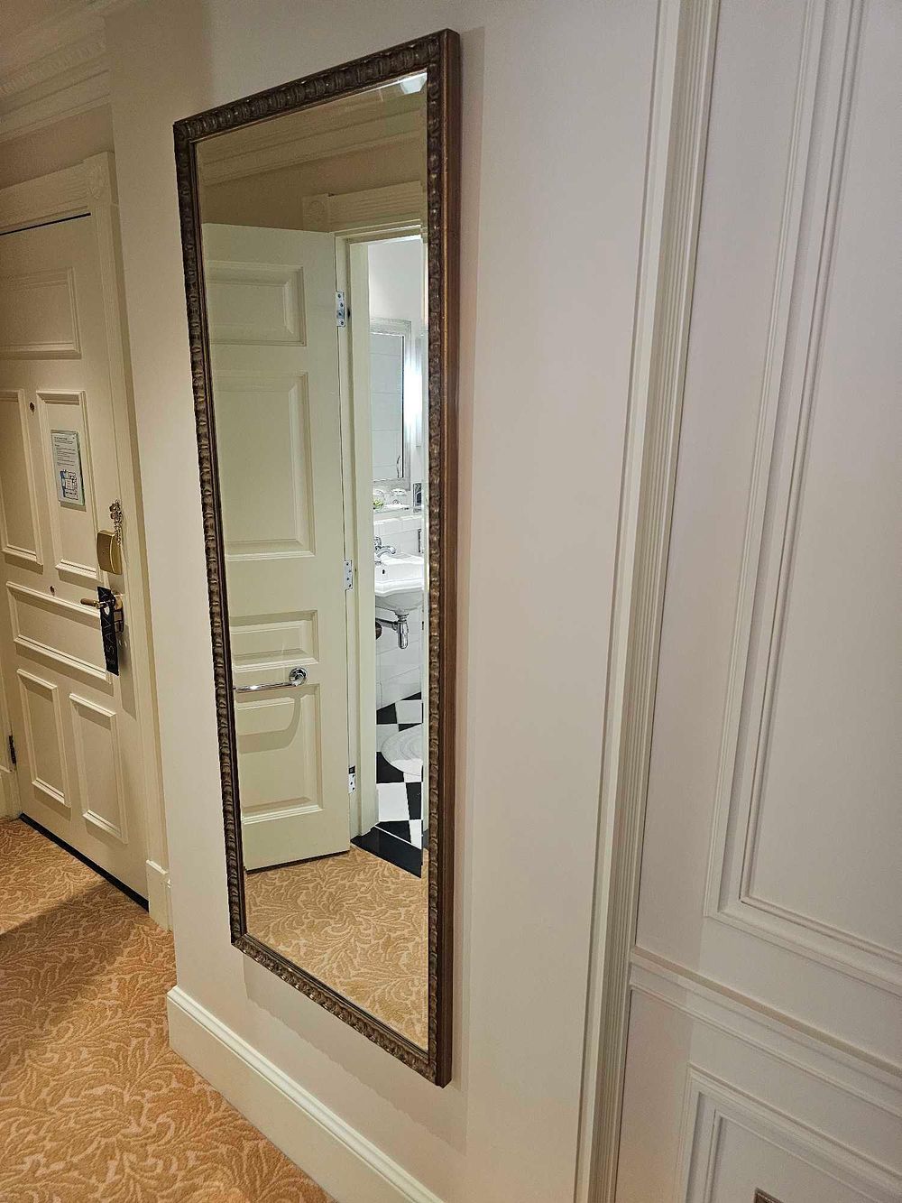 Lot 179: * Wall Mirror – Ornate Frame in Antiqued Bronze and Gold