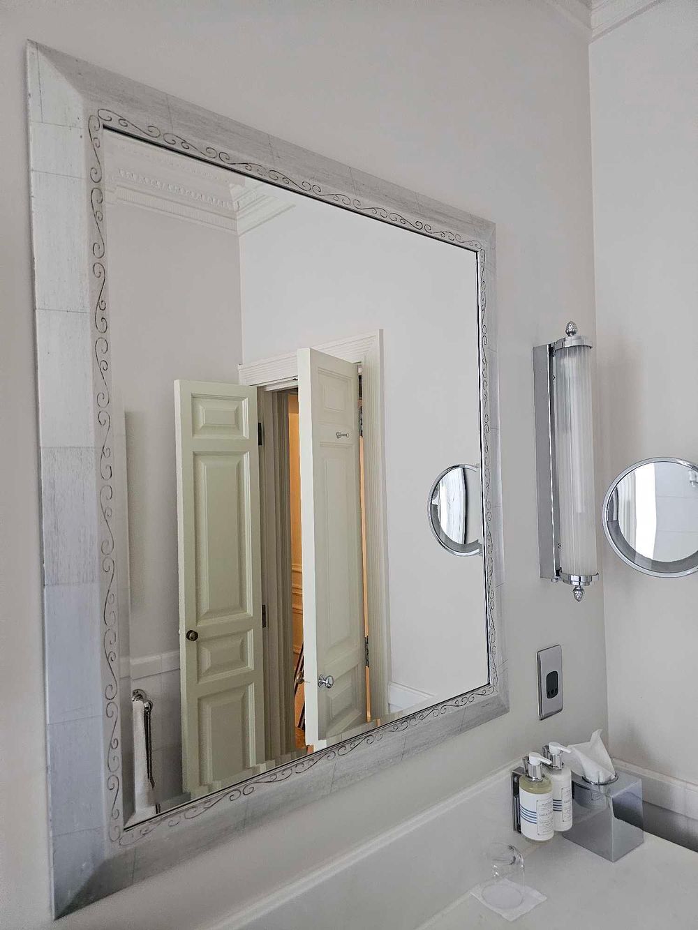 Lot 253: * Wall Mirror – Bevelled Plate with Decorated Silver Frame, 88 x 100cm
