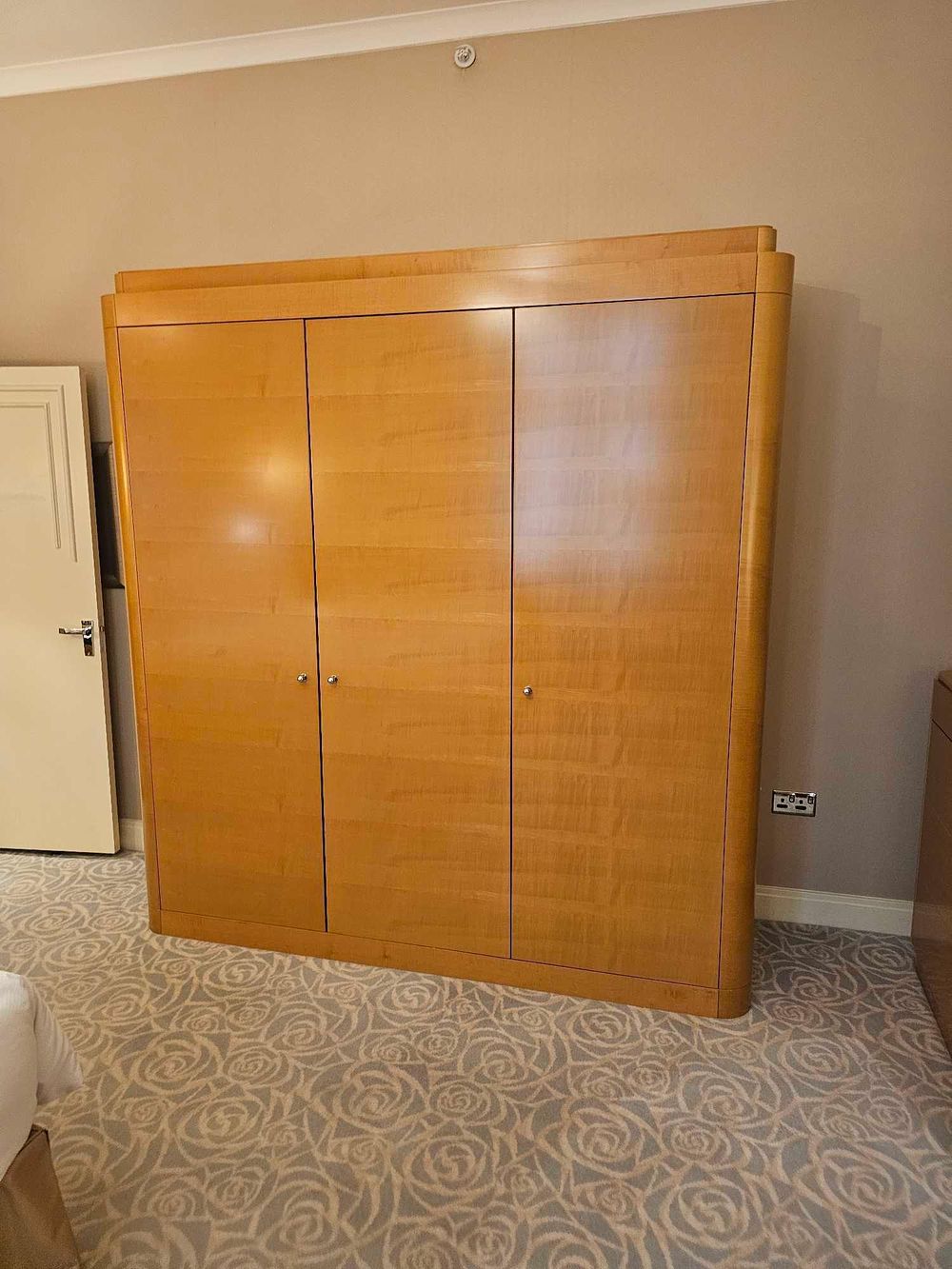 Lot 1012f: * Wardrobe – Francesco Molon Three-Door Maple Veneer Wardrobe with Integrated Storage
