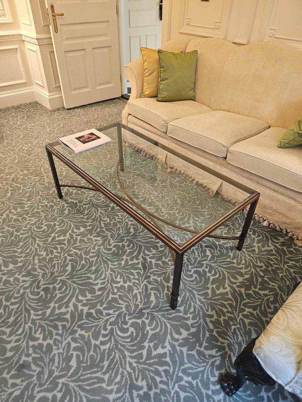 Lot 2219: * A rectangular Hollywood regency style coffee table finished in bronzed metal the tempered glass top