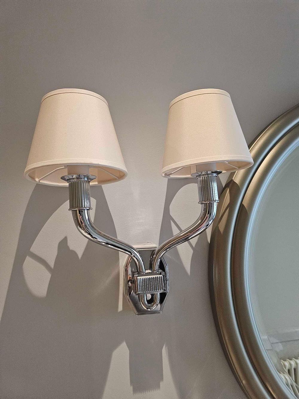 Lot 2289: * Pair of Wall Lights – Twin Arm Fixtures in Polished Nickel with Ribbed Detailing A matching pair of