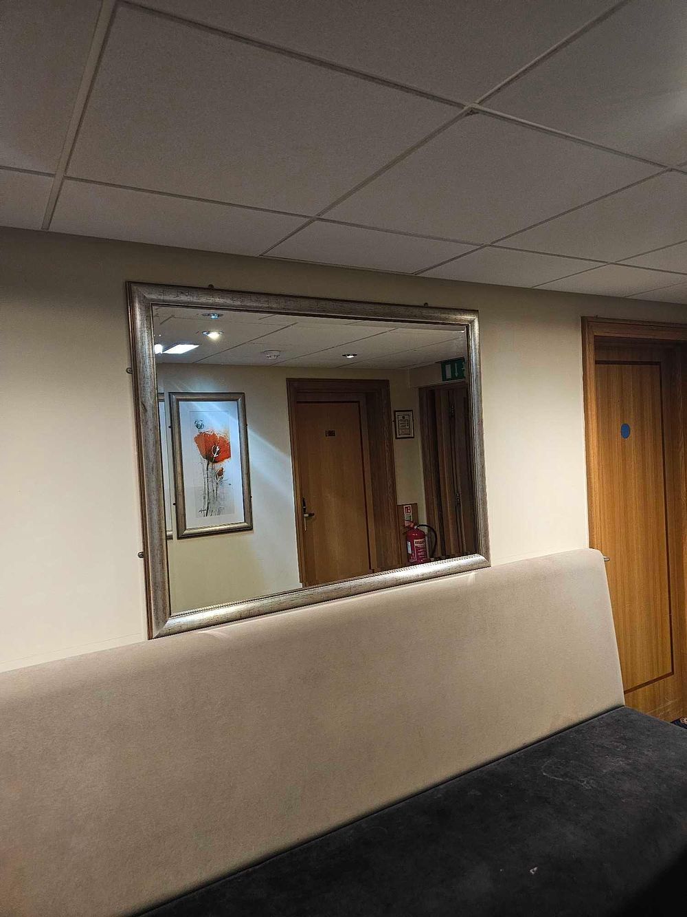 Lot 1092: * A framed bevelled mirror in silvered wood frame 133 x 103cm