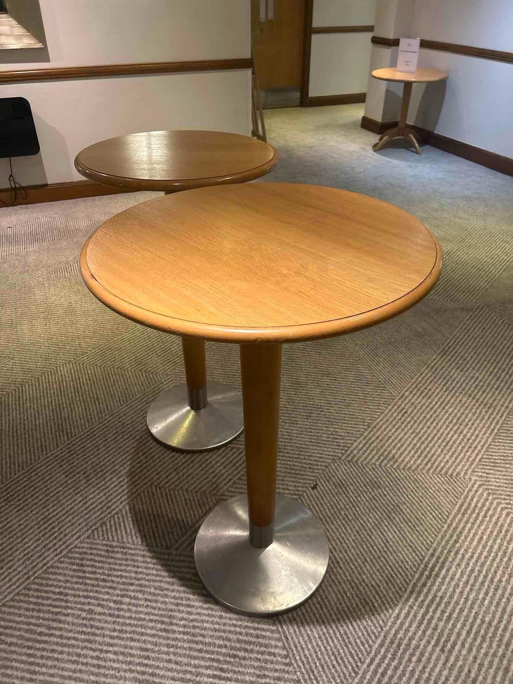 Lot 211: * 2x beech wood poser table with stainless steel base 1 x 70 x 105cm & 1 x 60 x 105cm