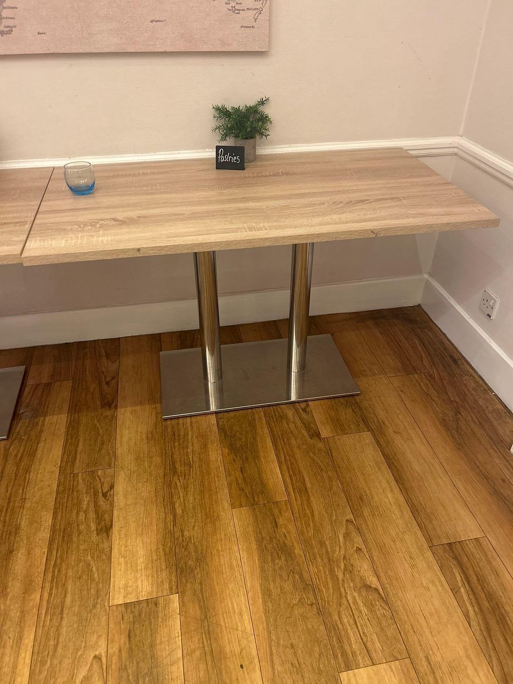 Lot 215: * 2x light wood dining tables with stainless steel base 130 x 71 x 78cm