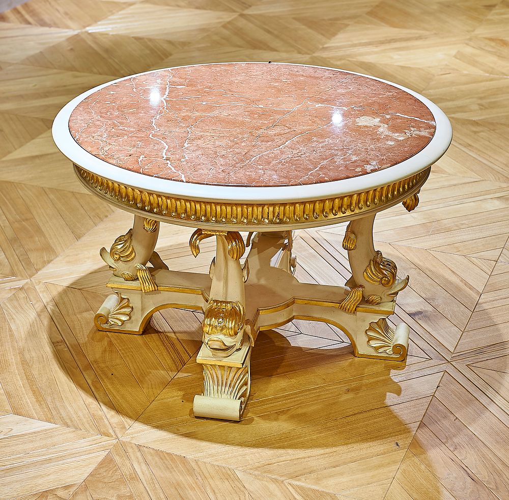 Lot 801: Lounge Table "Dauphin" in Empire Style is a monumental architectural piece that exemplifies the