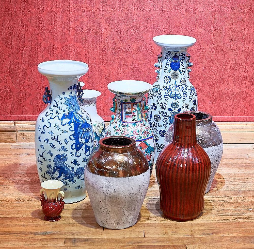 Lot 175: * A diverse collection of nine decorative vases showcasing a blend of traditional Chinese and