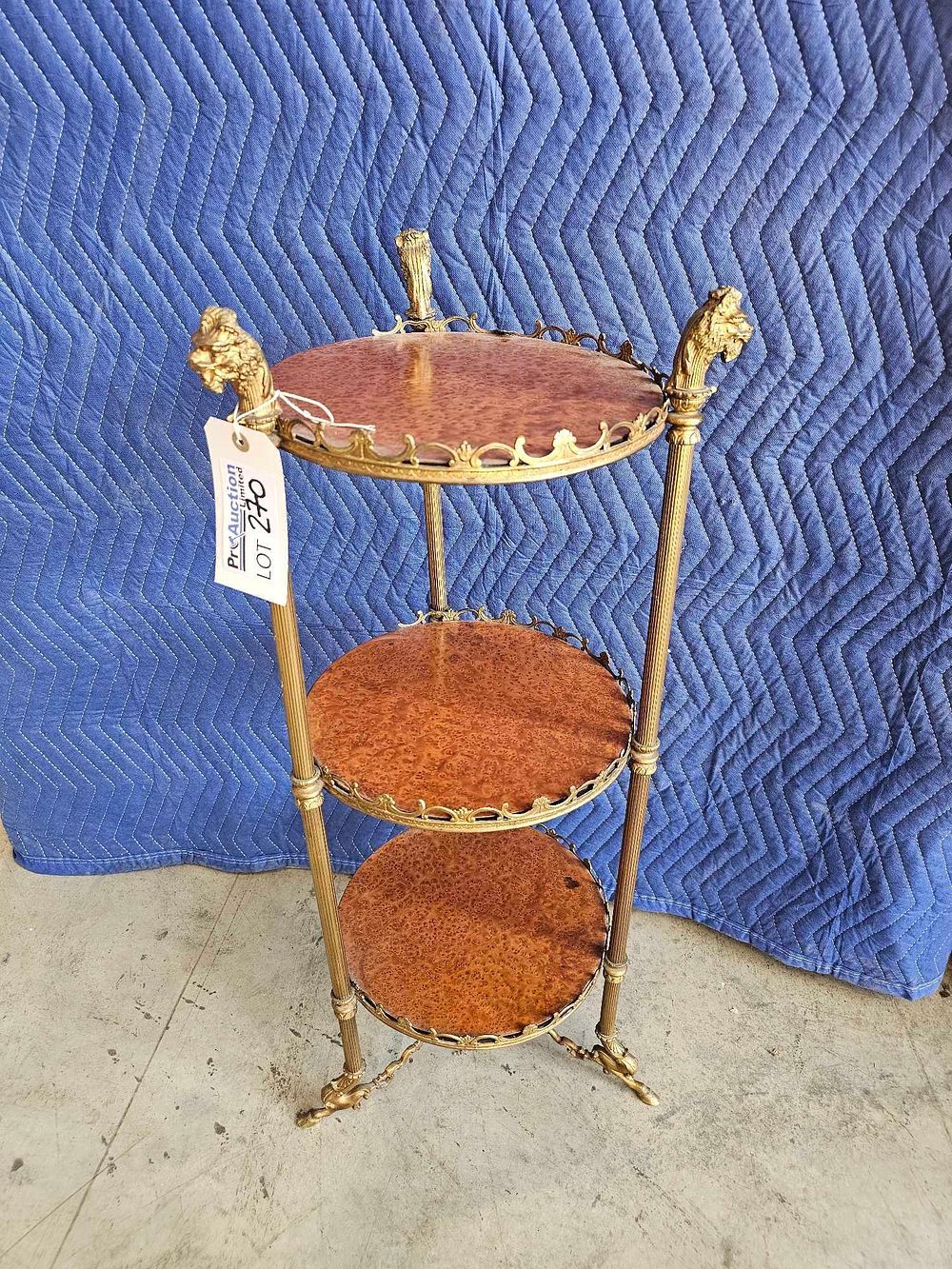 Lot 270: * Victorian Style Three Tier Figural Shelf/Plant Stand With Figural And Repousse Detailing 31 X 91cm