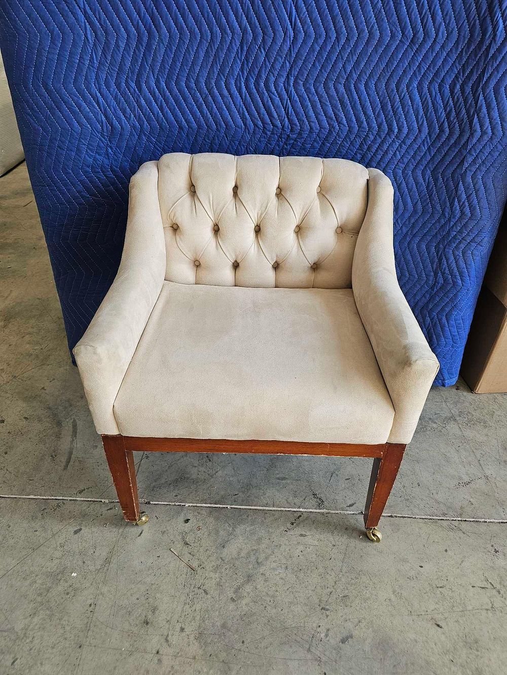 Lot 275: * A Pair Of Upholstered Tufted Armchairs Raised On Castors 56 X 60 X 72cm