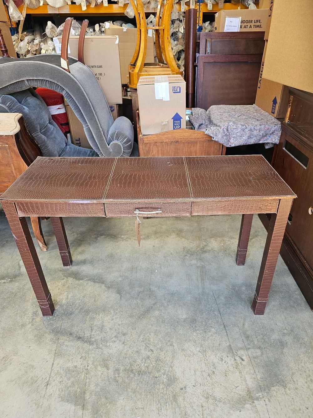 Lot 339: * A Rectangular Single Drawer Table With