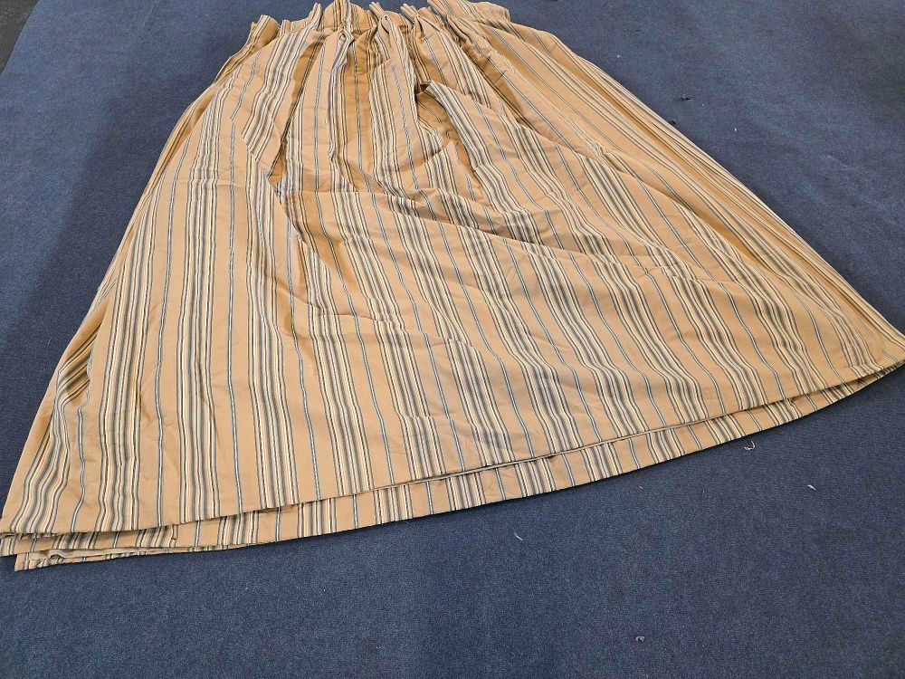 Lot 3046: * A Pair Lined Pencil Pleat Top Of Patterned Drapes Gold Tan Muted Base Gives