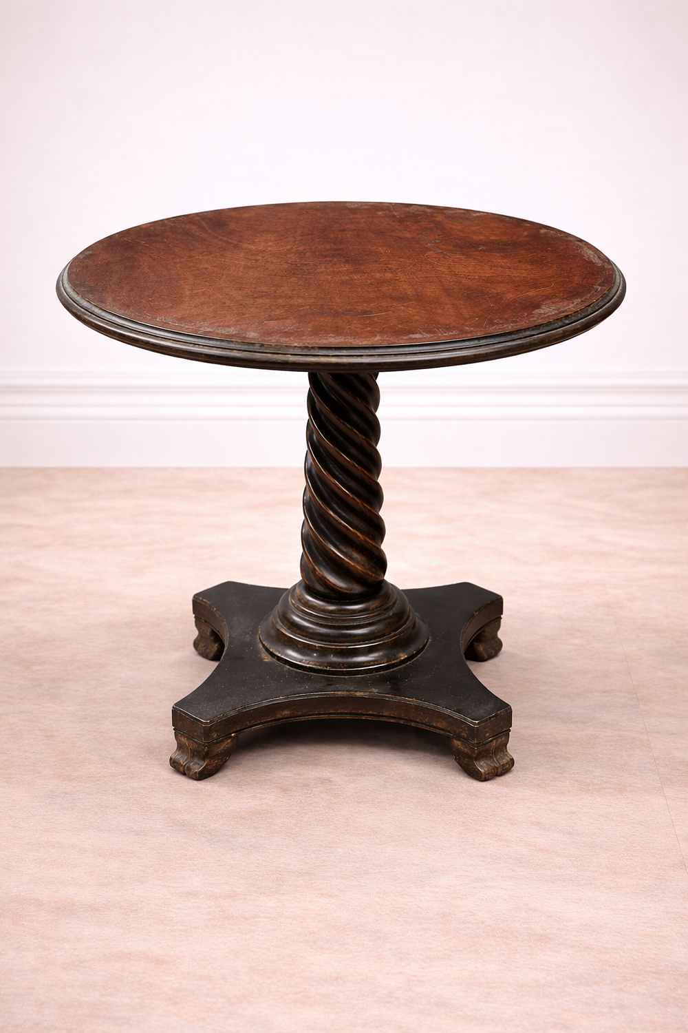 Lot 832: * A circular occasional table by John Tanous
