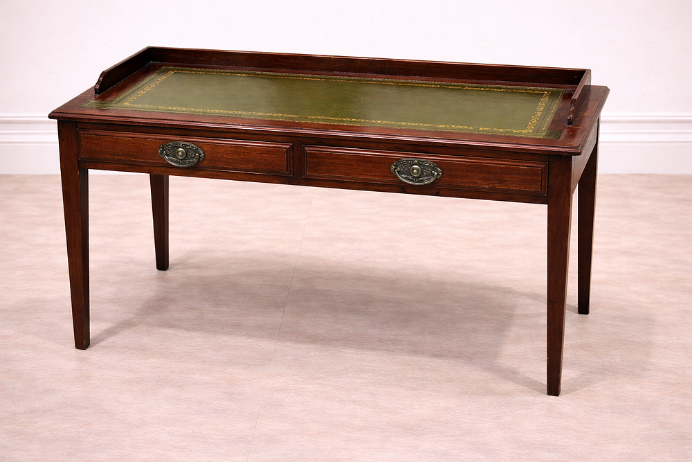 Lot 844: * An Edwardian-style mahogany writing table