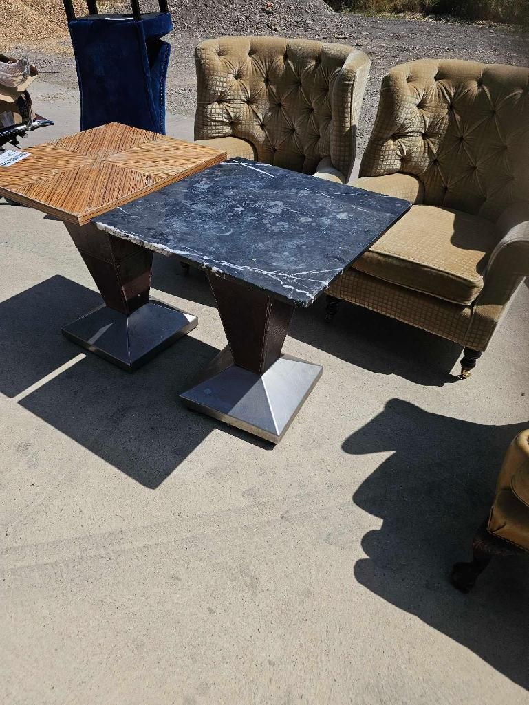 Lot 852: * A dining table featuring a square grey-veined stone top with a polished finish
