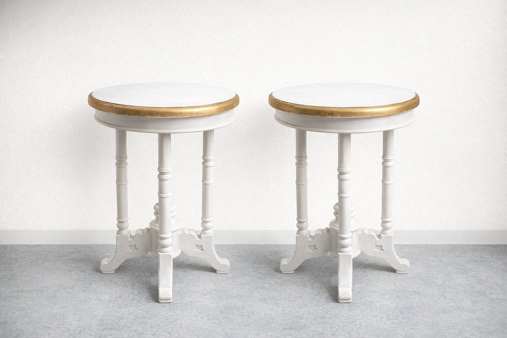 Lot 866: * Pair of round occasional side tables features an antique white finish with a decorative