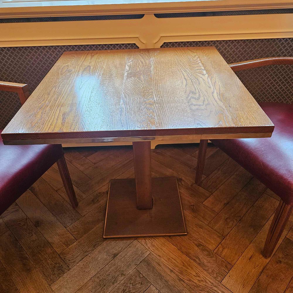 Lot 1146: * 2 x Dining table oak top raised over copper pedestal 65 x 75 x 72cm