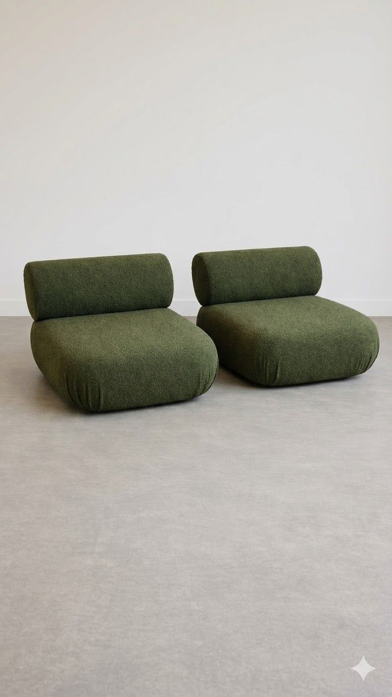 Lot 393: * A pair Boucle Moss Green armless lounge chair upholstered in a rich moss green bouclé fabric