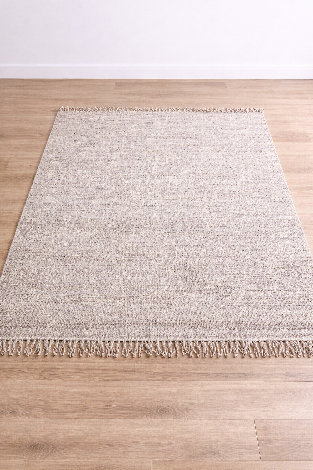 Lot 746: * A contemporary flat-weave area rug measuring 166cm x 242cm