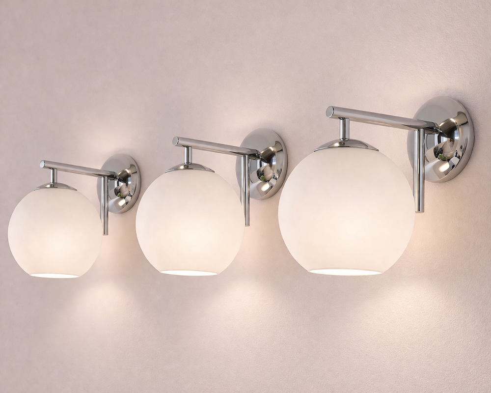 Lot 147: * A set of 3 I-Lite Pelota Modern Globe Wall Sconces Silver