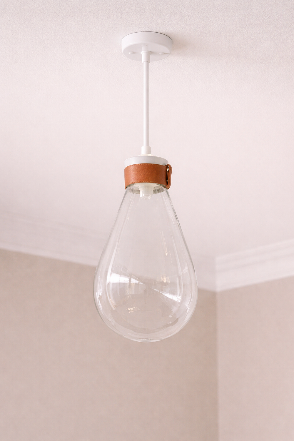 Lot 170: * I-Lite Soffi-Inspired White Leather Pendant