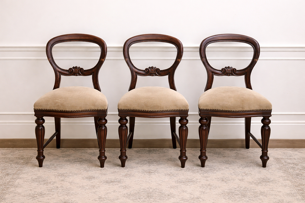 Lot 234: * A set of three mahogany Victorian balloon-back chairs