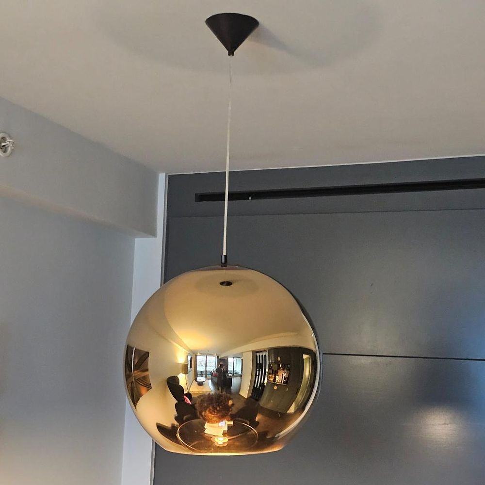 Lot 322: * Tom Dixon Gold Round LED Pendant (Model SPA06) Vacuum metallisation defines the Tom Dixon Round LED