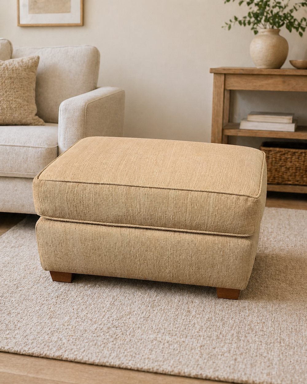 Lot 213: * A rectangular footstool upholstered in a golden yellow linen slub fabric