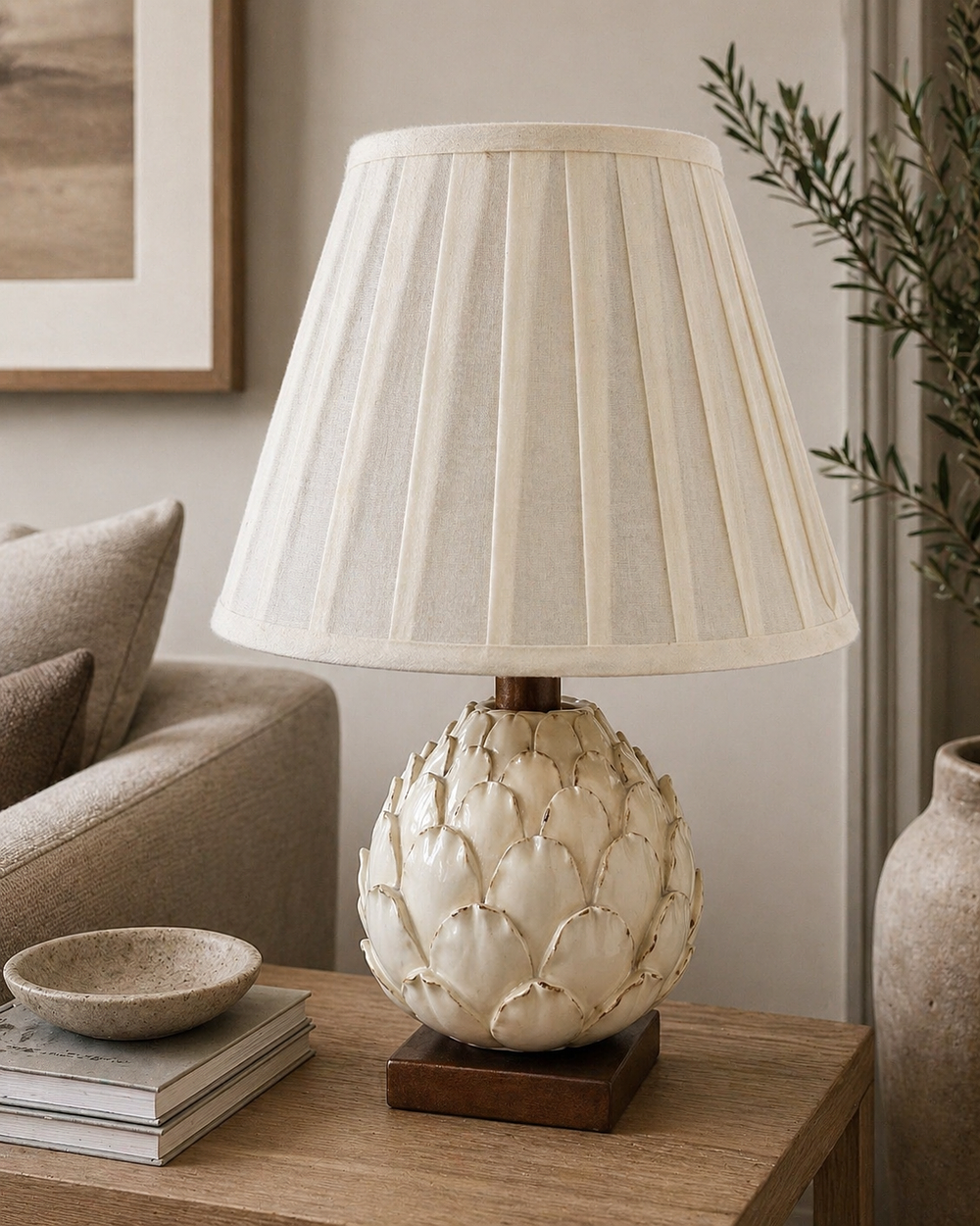 Lot 221: * A table lamp featuring a cream ceramic base moulded in the form of an artichoke with a distressed
