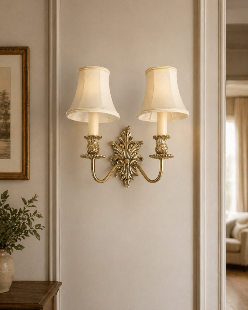 Lot 217: Set of four twin-arm wall sconces