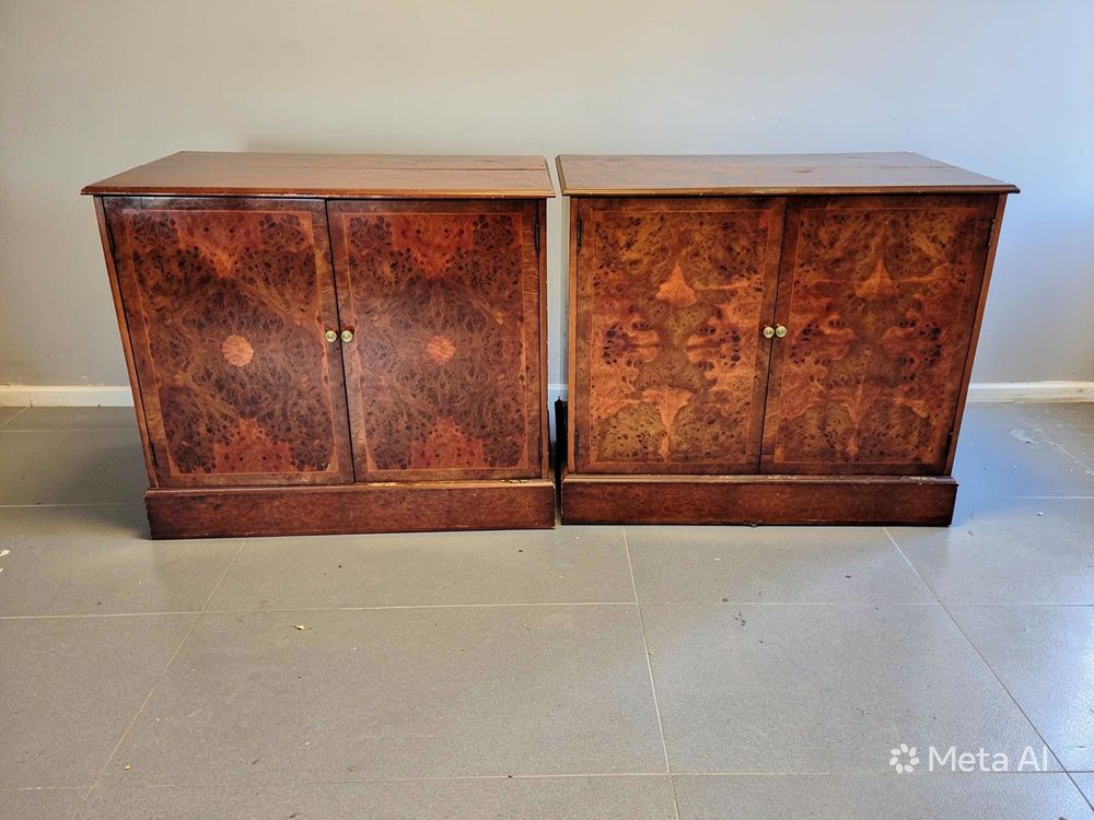 Lot 283: A pair of two-door low storage sideboards, each measuring 106 x 58 x 94 {cm}