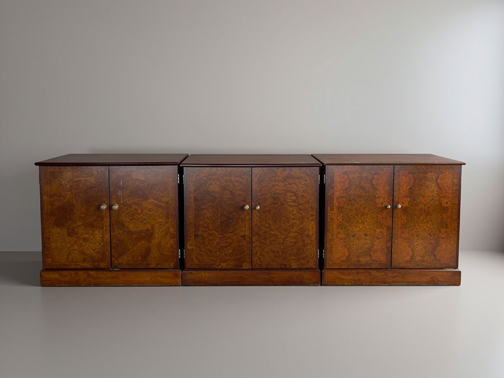 Lot 284: A matching suite of three low two-door side cabinets