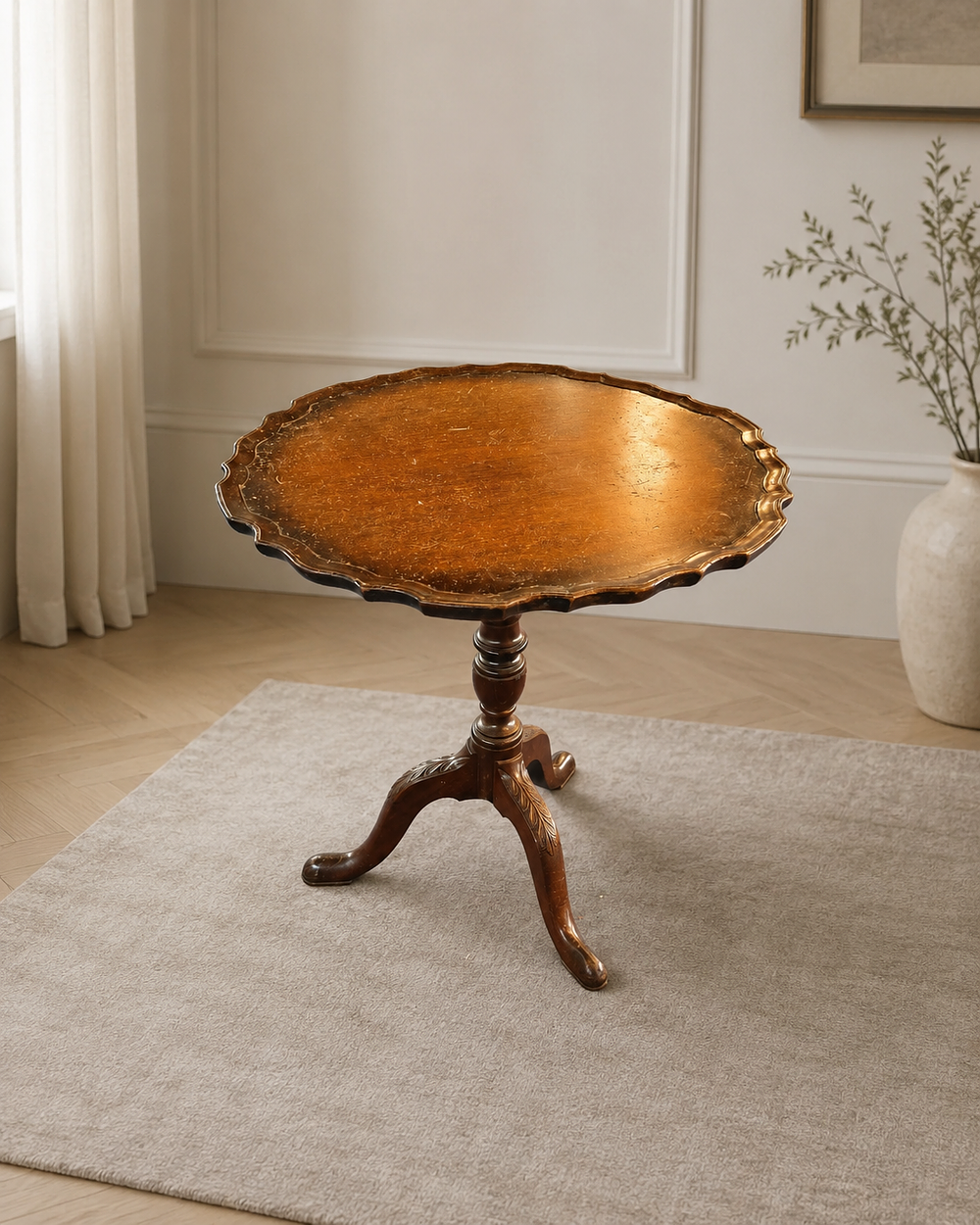 Lot 439: A reproduction mahogany tripod side table in the Georgian style