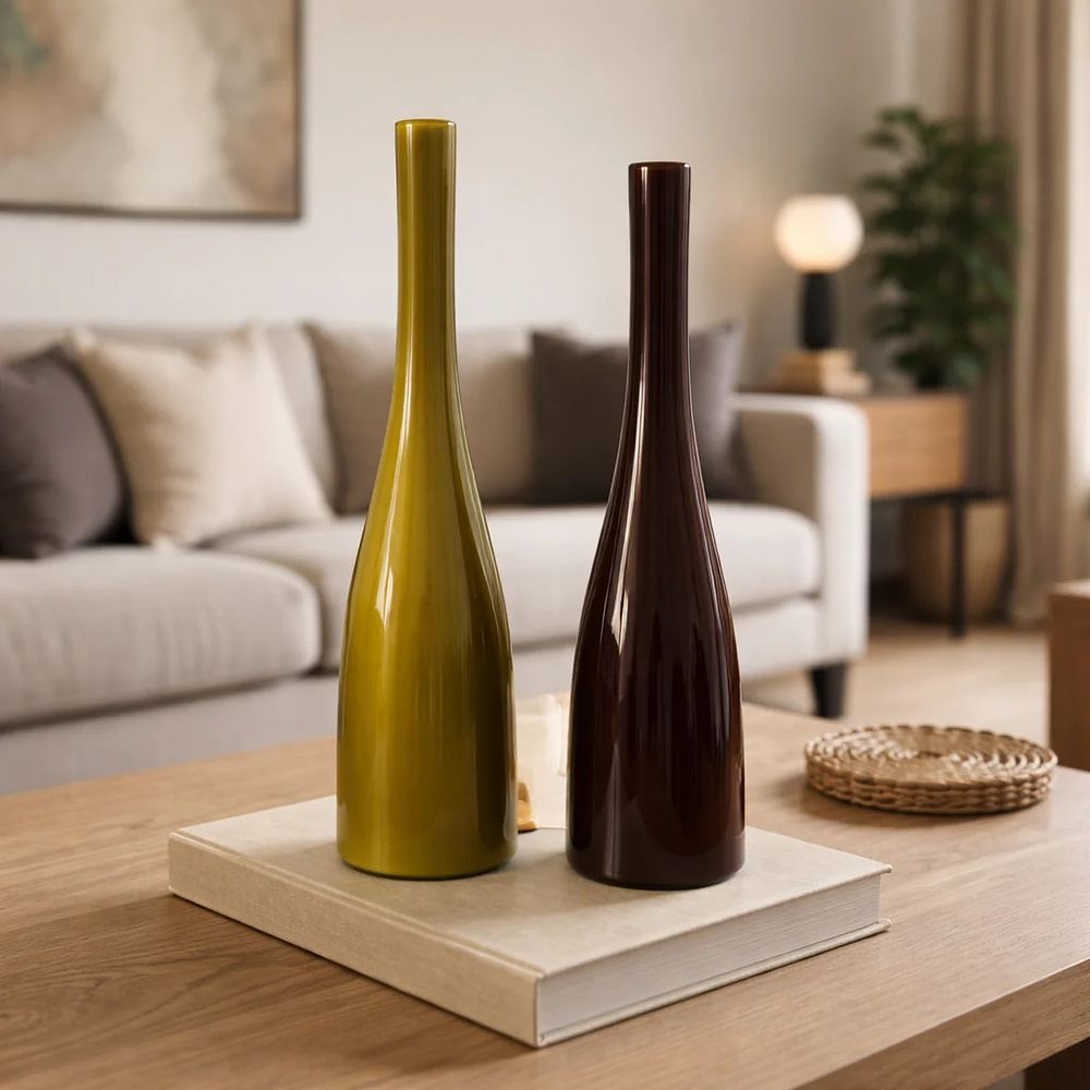 Lot 478: Roma Ceramic Bottles – Set of 2. Pair of handcrafted ceramic bottles. Includes one rich chartreuse