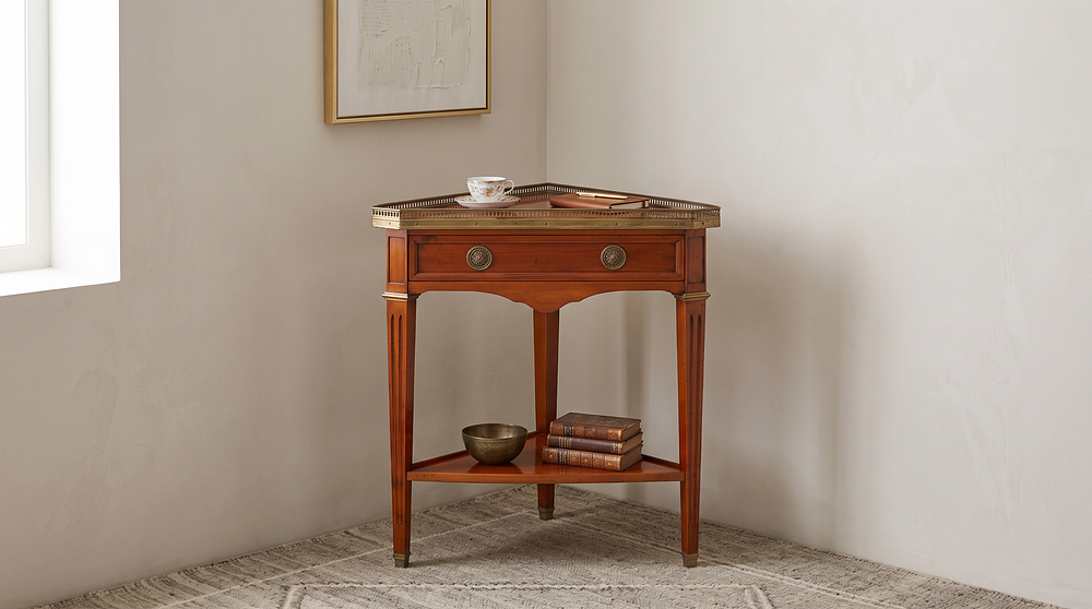 Lot 239: Gueridon Triangle in Louis XVI Style is a sophisticated architectural piece designed for corner