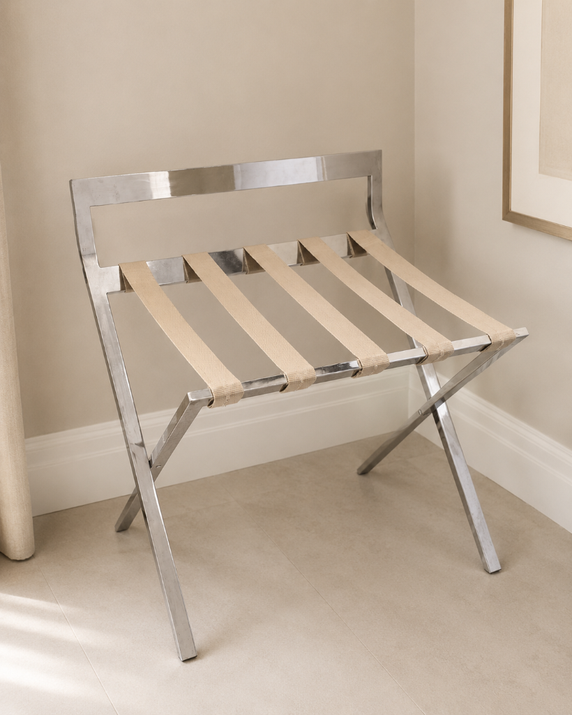 Lot 260: Mertnk folding luggage rack constructed from polished stainless steel