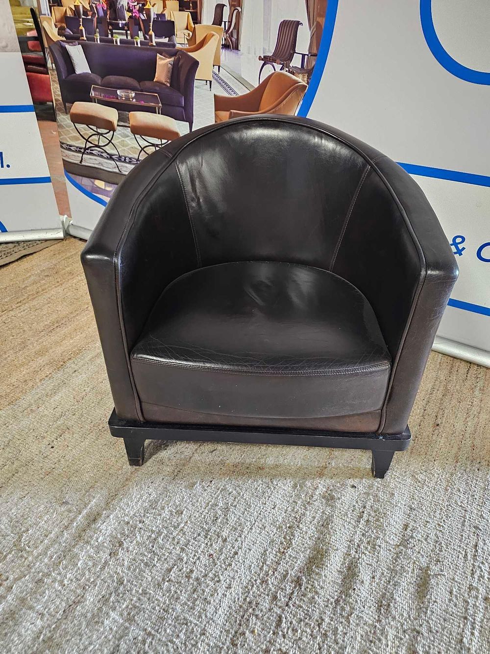 Lot 1187: Bespoke Pure CF Black Leather Tub Chair for Kerridge's Bar & Grill, Corinthia London