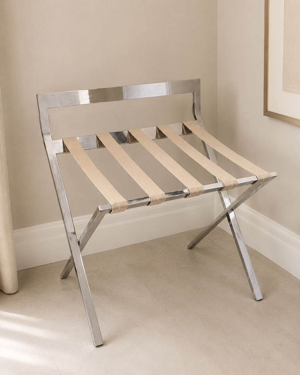 Lot 276: Mertnk folding luggage rack constructed from polished stainless steel