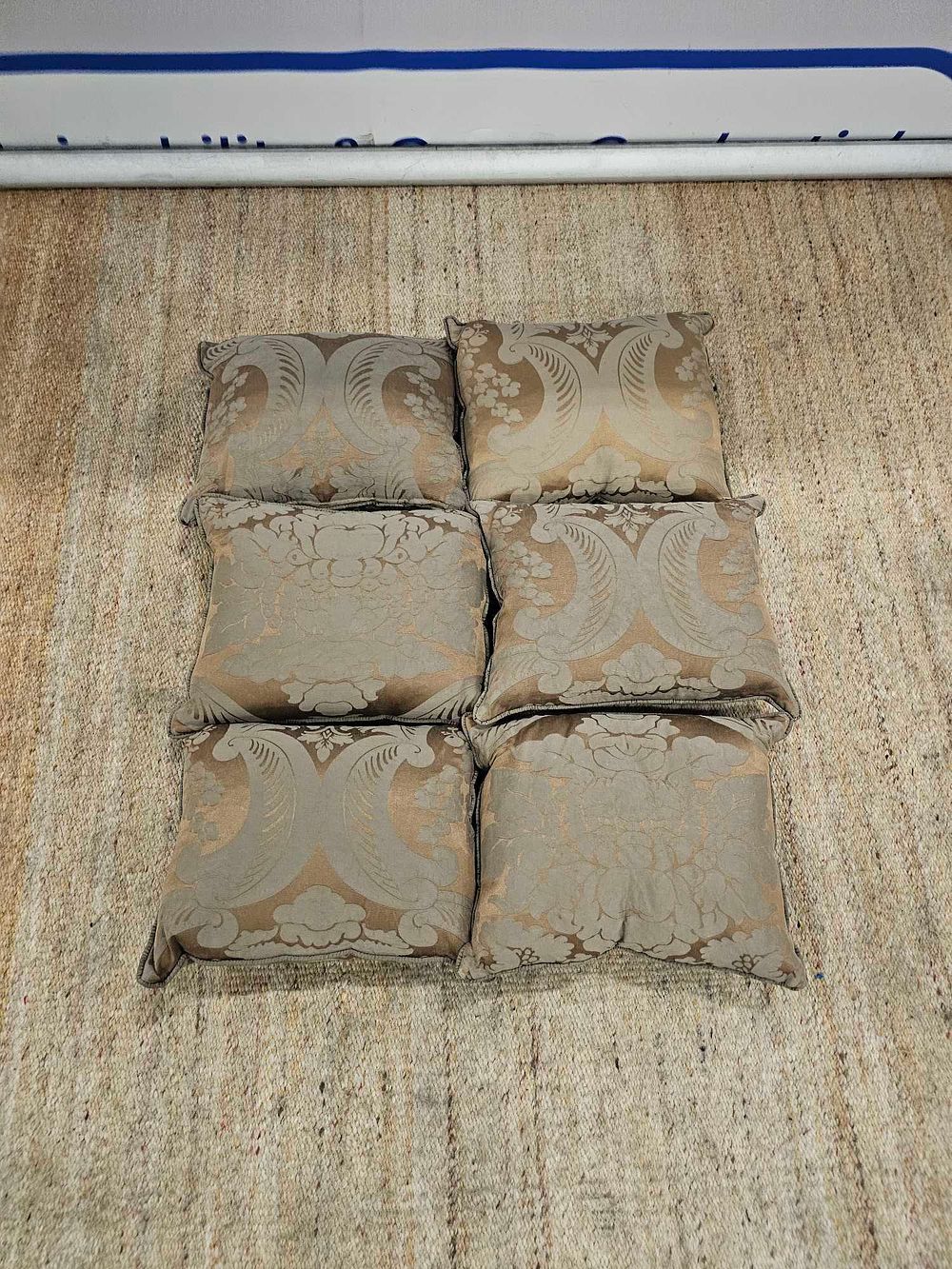 Lot 722: A lot consisting of six elegant bronze patterned silk scatter cushions
