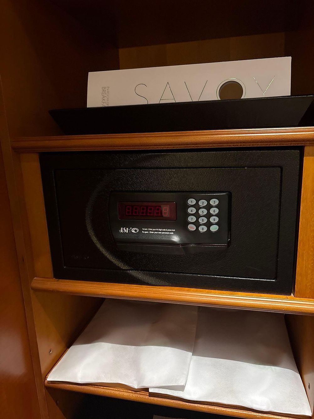 Lot 232: A JSH digital room safe featuring a textured matte black steel construction
