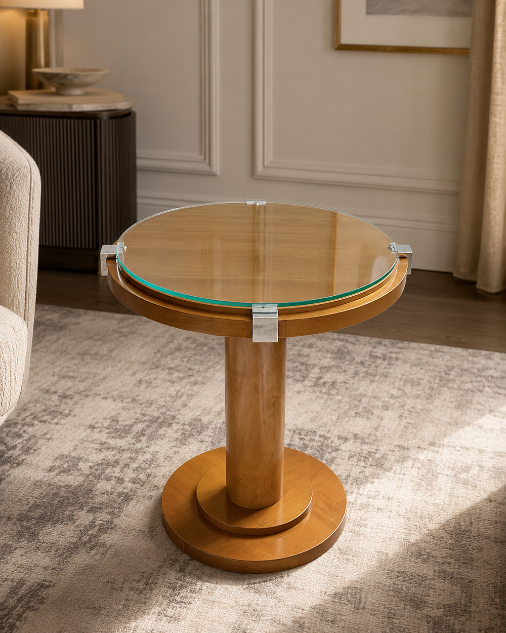 Lot 1136: An Art Deco Style Maple and Glass Circular Pedestal Occasional Table by Francesco Molon
