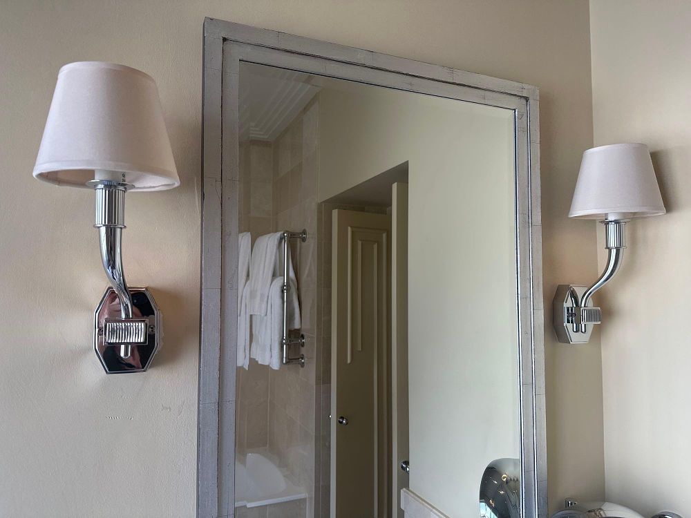 Lot 1544: A pair of Art Deco Style Single-Arm Wall Sconces in Polished Nickel