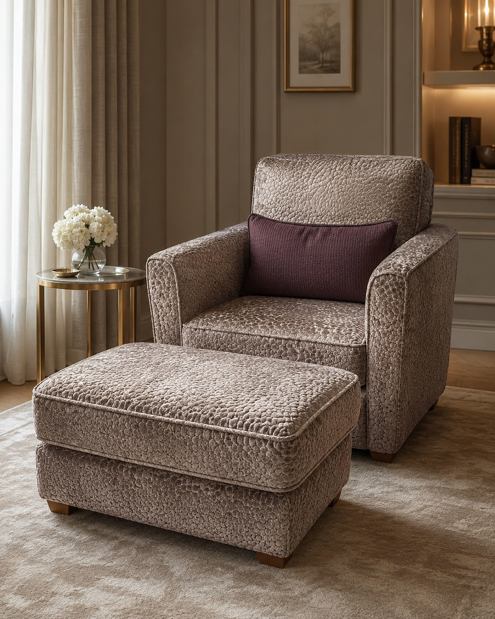 Lot 1586: A Contemporary Club Armchair and Coordinating Footstool in Textured Velvet
