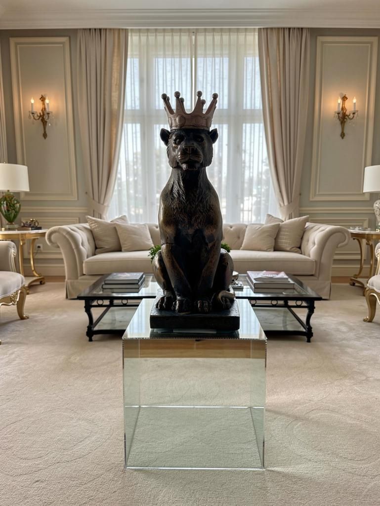 Lot 402: A Pair of Eccentric Contemporary Resin Seated Lion Sculptures on Mirrored Plinths Embodying a