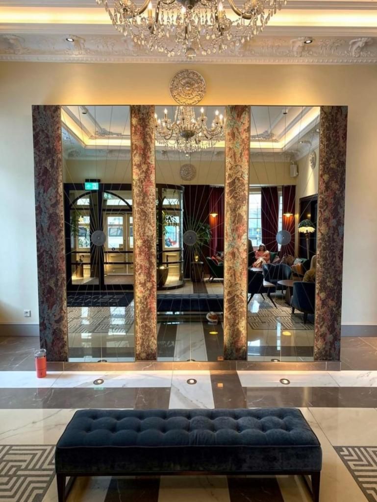 Lot 414: A Bespoke Tall Hinged Bronzed Mirror Wall Panels