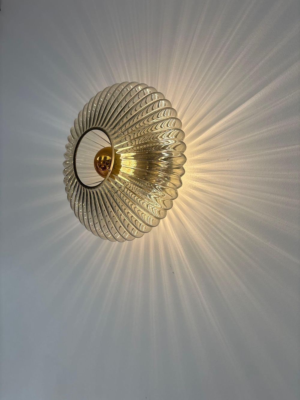 Lot 427: A set of 4 x Chelsom Glass Effect GE/742/SMOKE wall lamp Deeply ribbed elliptical shaped
