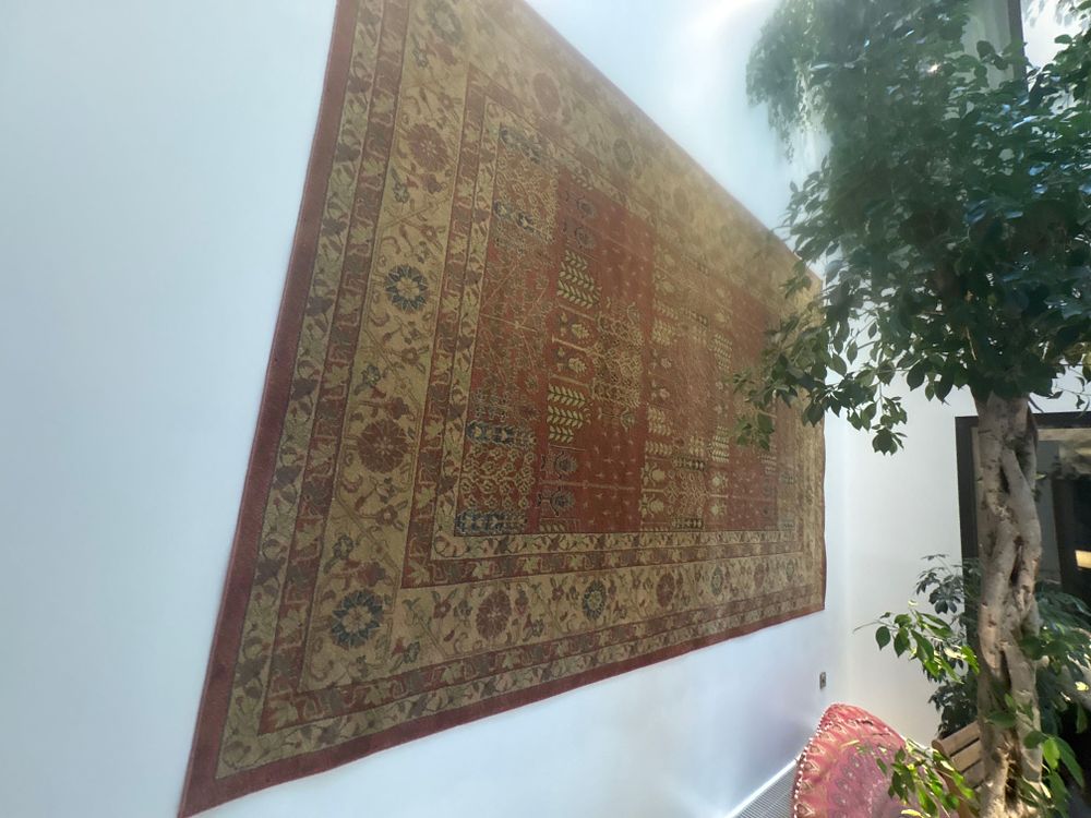 Lot 446: A Grand "Classic Heritage" Windsor Pattern Area Rug – Crimson and Cream Embodying a timeless British
