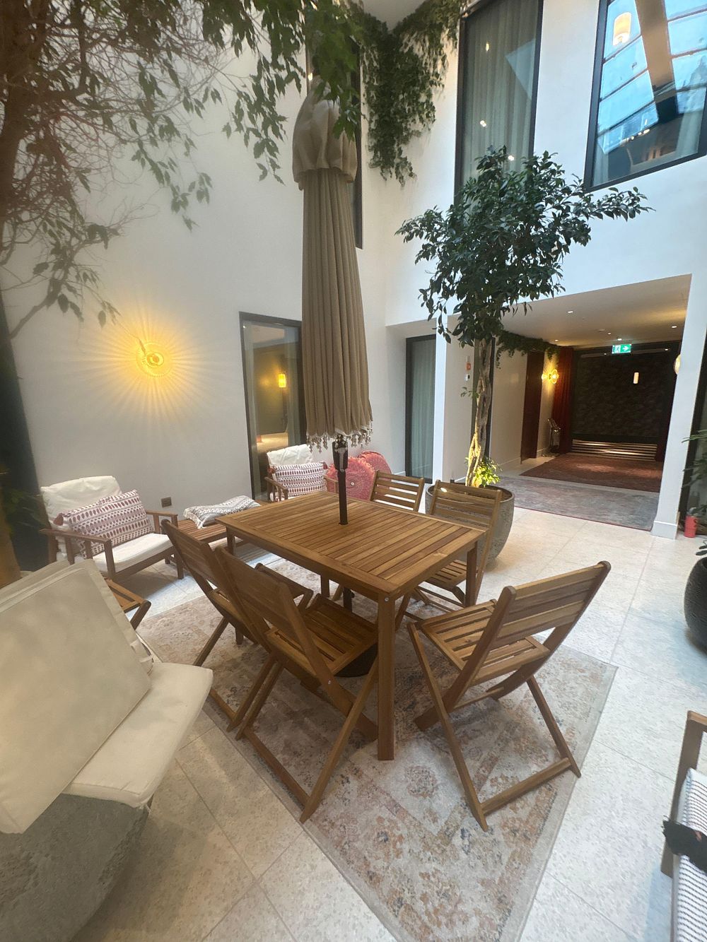 Lot 450: A Premium "Garden Must Haves" Outdoor Parasol & Teak-Stained Dining SuiteThe Parasol: "Garden Must