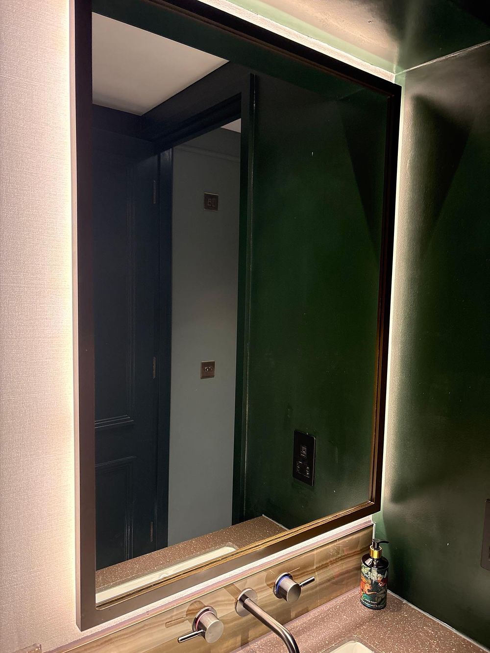 Lot 1849: A rectangular bathroom mirror clean linear framed 74 x 100cm