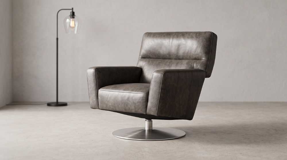 Lot 351: * Timothy Oulton Silva Swivel Chair in Hand Tipped Graphite Brushed Stainless Steel is a sleek