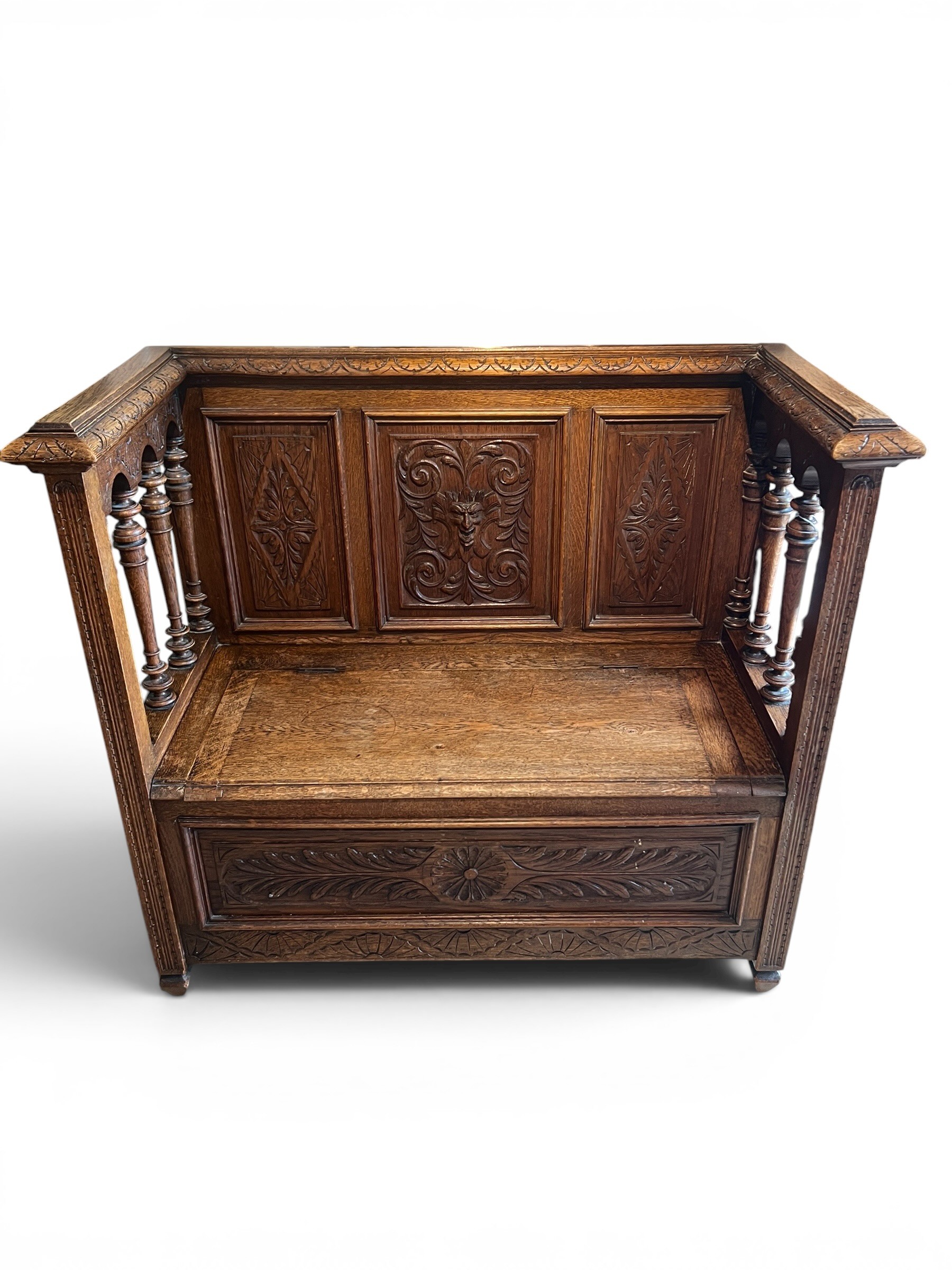Heavily Carved Late Victorian Oak Hall Settle / Church Pew Featuring a Lift-Up